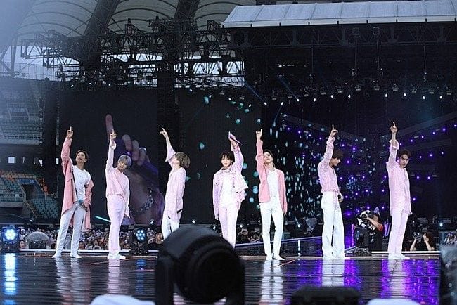 BTS performing at a Japanese stadium
