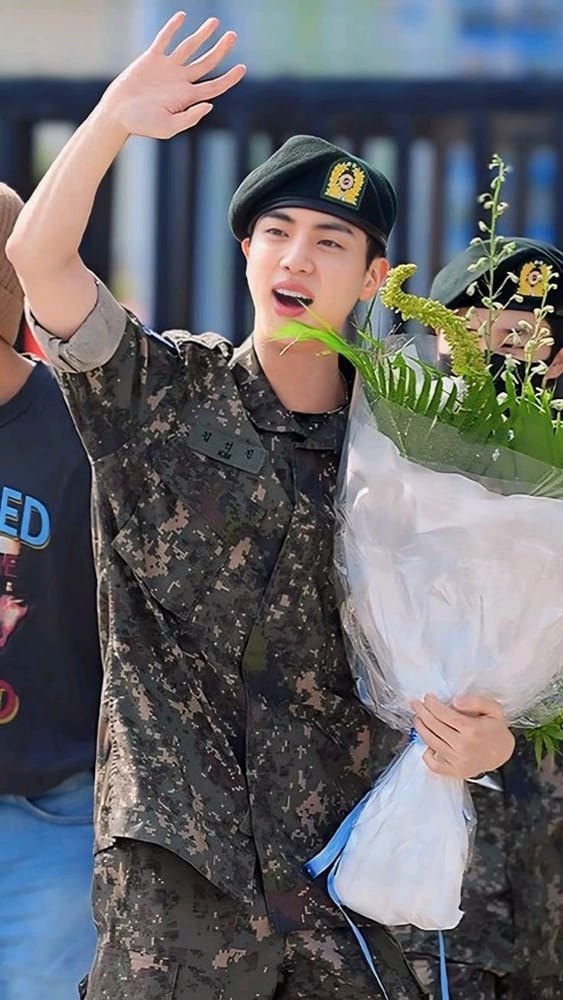 Jin completing military service